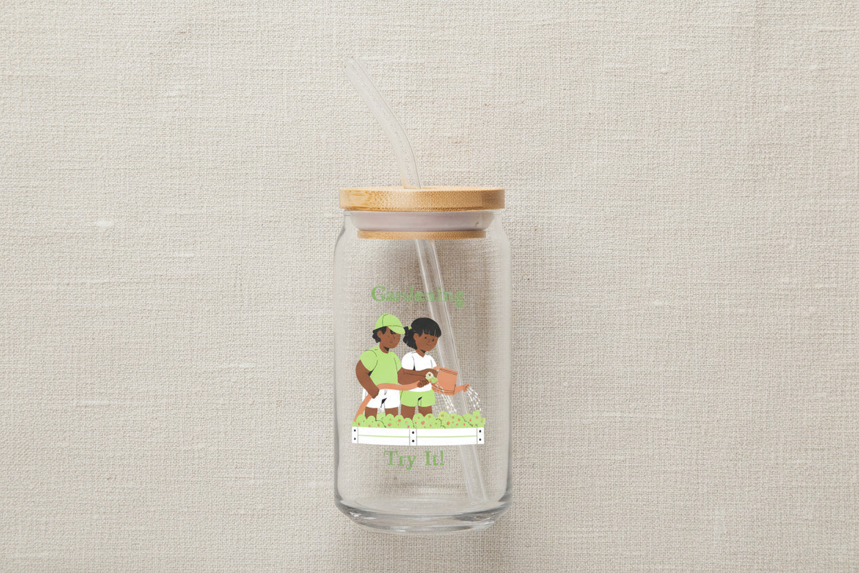 Glass tumbler with a straw lid featuring an illustration of two people gardening and text on a white background.