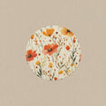 Round ceramic plate with floral design on a white background