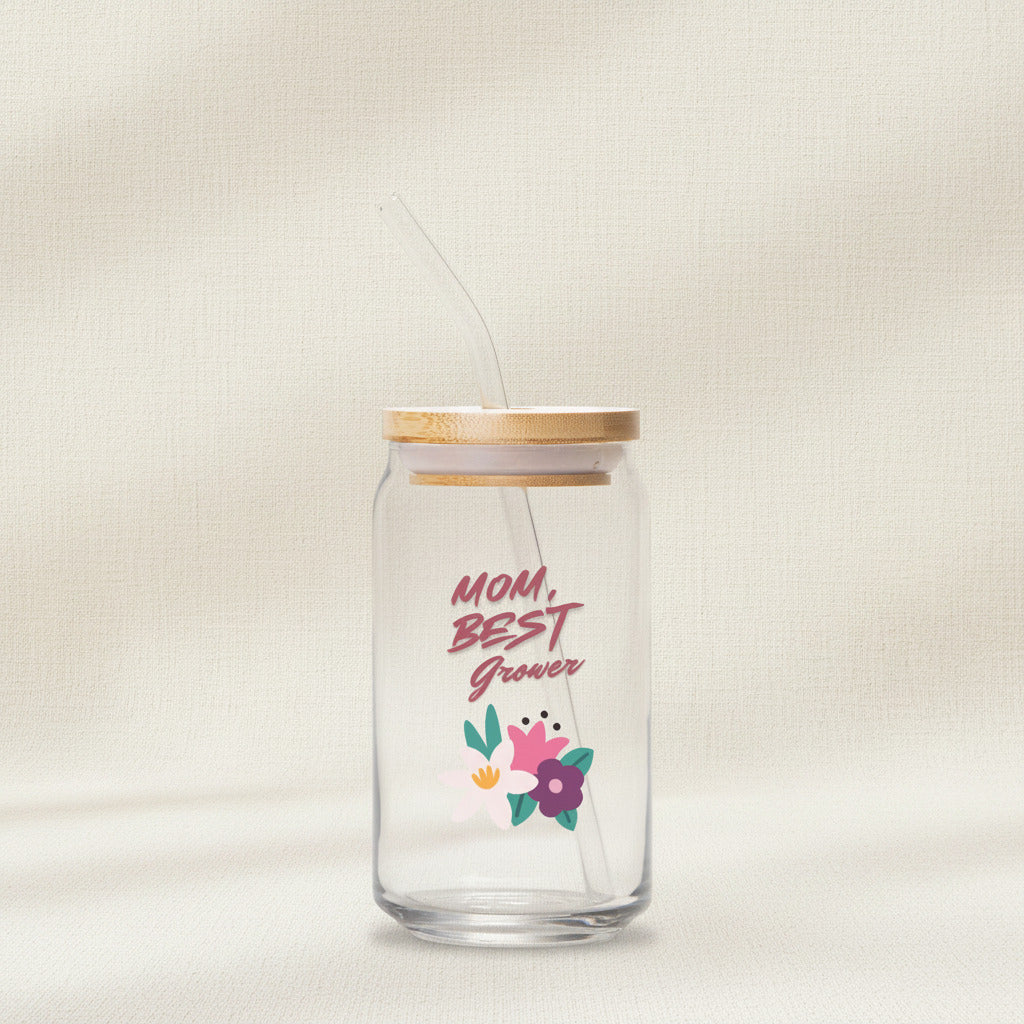 Clear glass jar with straw and wooden lid, featuring 'Mom, Best Grower' text and floral design on a white background.