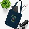 Navy tote bag with 'Mommy Gardener' text and floral design on a white surface with stationery items.