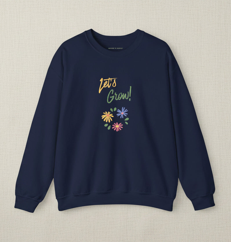 Navy blue sweatshirt with 'Let's Grow!' text and floral designs on a white background