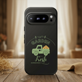Black phone case with green truck and 'Garden Fresh' text on a wooden surface.