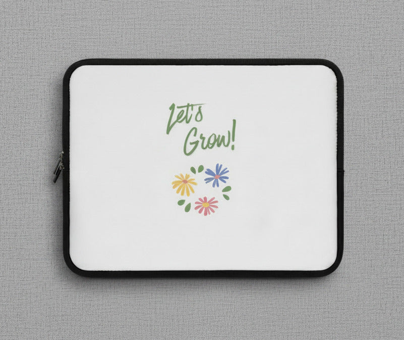 Laptop sleeve with 'Let's Grow!' text and colorful flowers on a white background