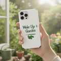 Phone case with 'Wake Up & Garden' text and leaf design on a white background