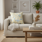Beige sofa with floral pillow and decorative items in a living room setting