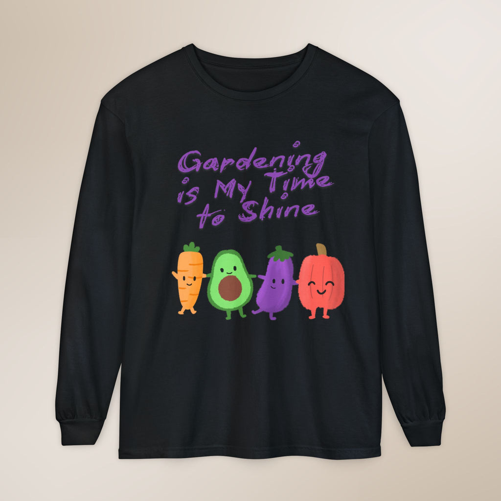 Black long-sleeve shirt with cartoon vegetables and text on a beige background