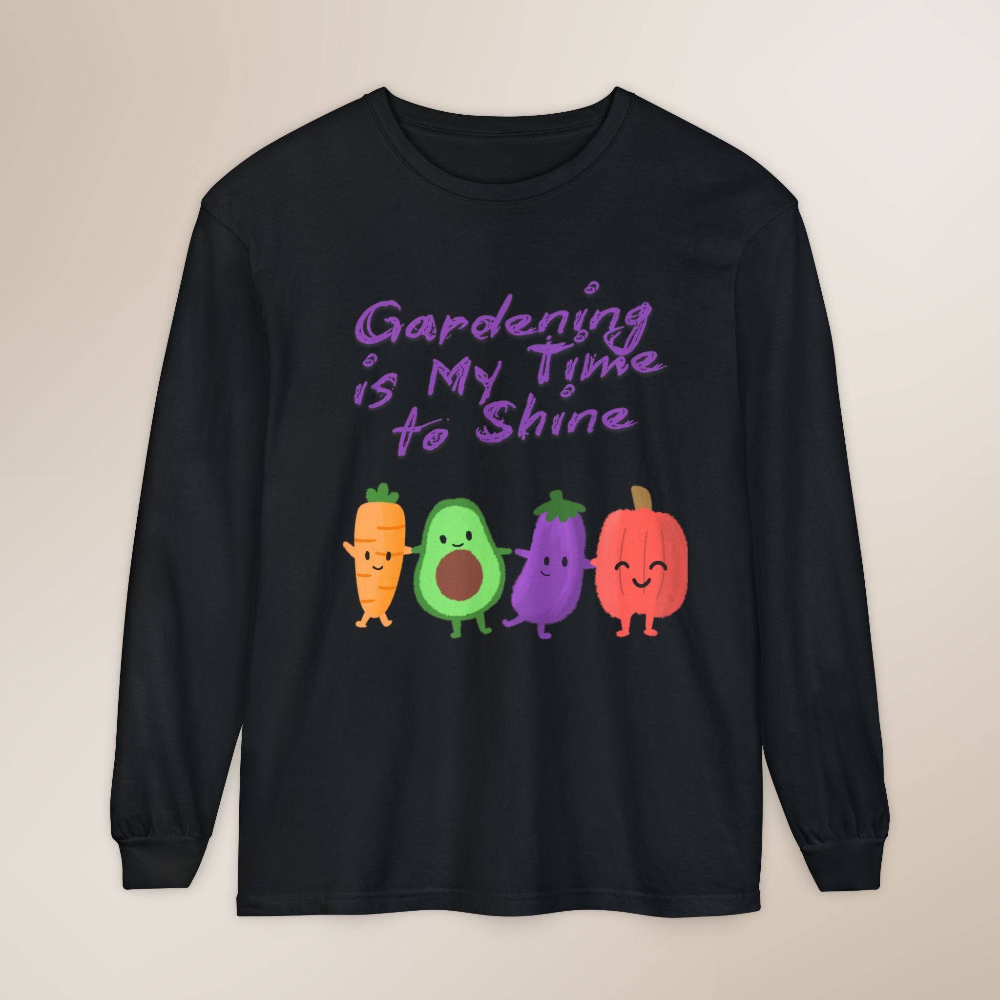 Black long-sleeve shirt with cartoon vegetables and text on a beige background