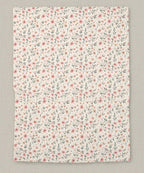 Floral patterned paper with small pink flowers on a white background