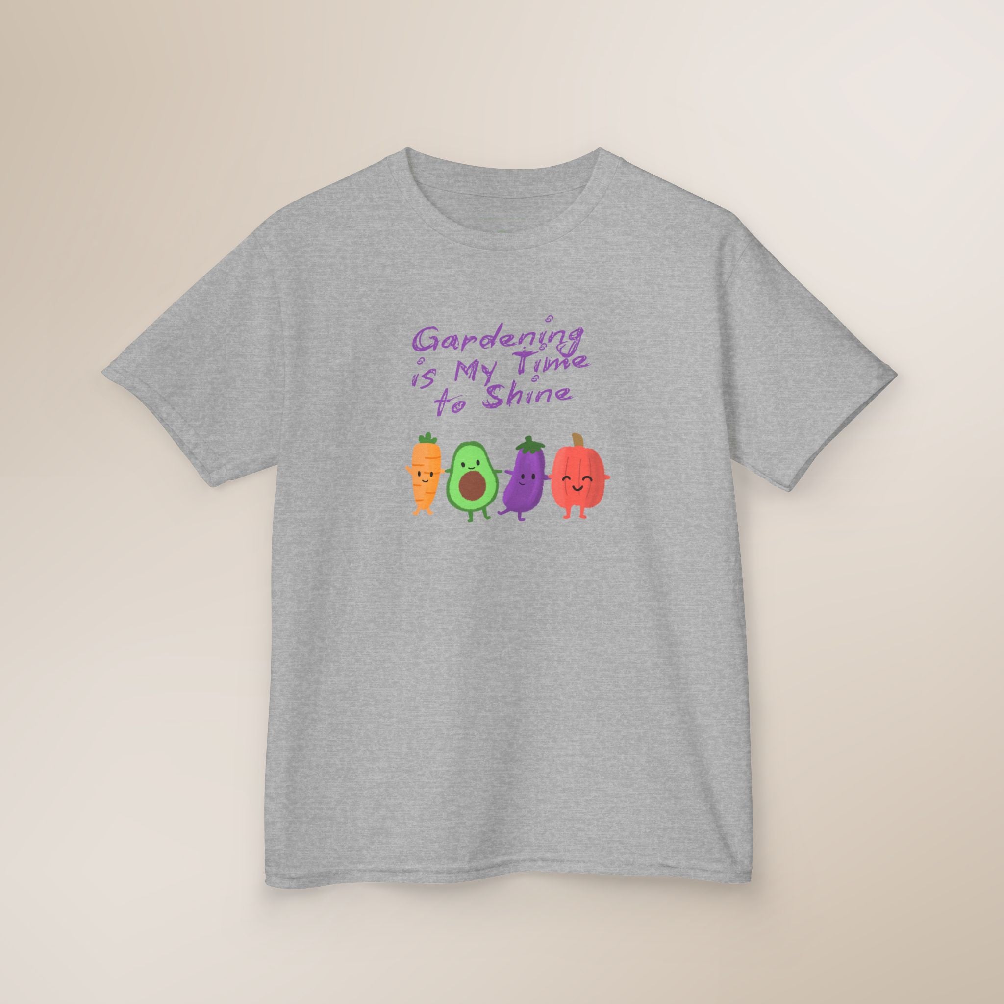 Gray t-shirt with colorful vegetables and text on a beige background