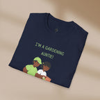 Folded navy blue t-shirt with 'I'm a Gardening Auntie!' text and graphic on a beige background