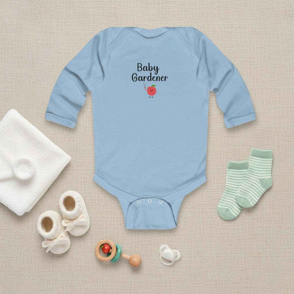 Light blue baby onesie with 'Baby Gardener' text and an apple graphic on a white background