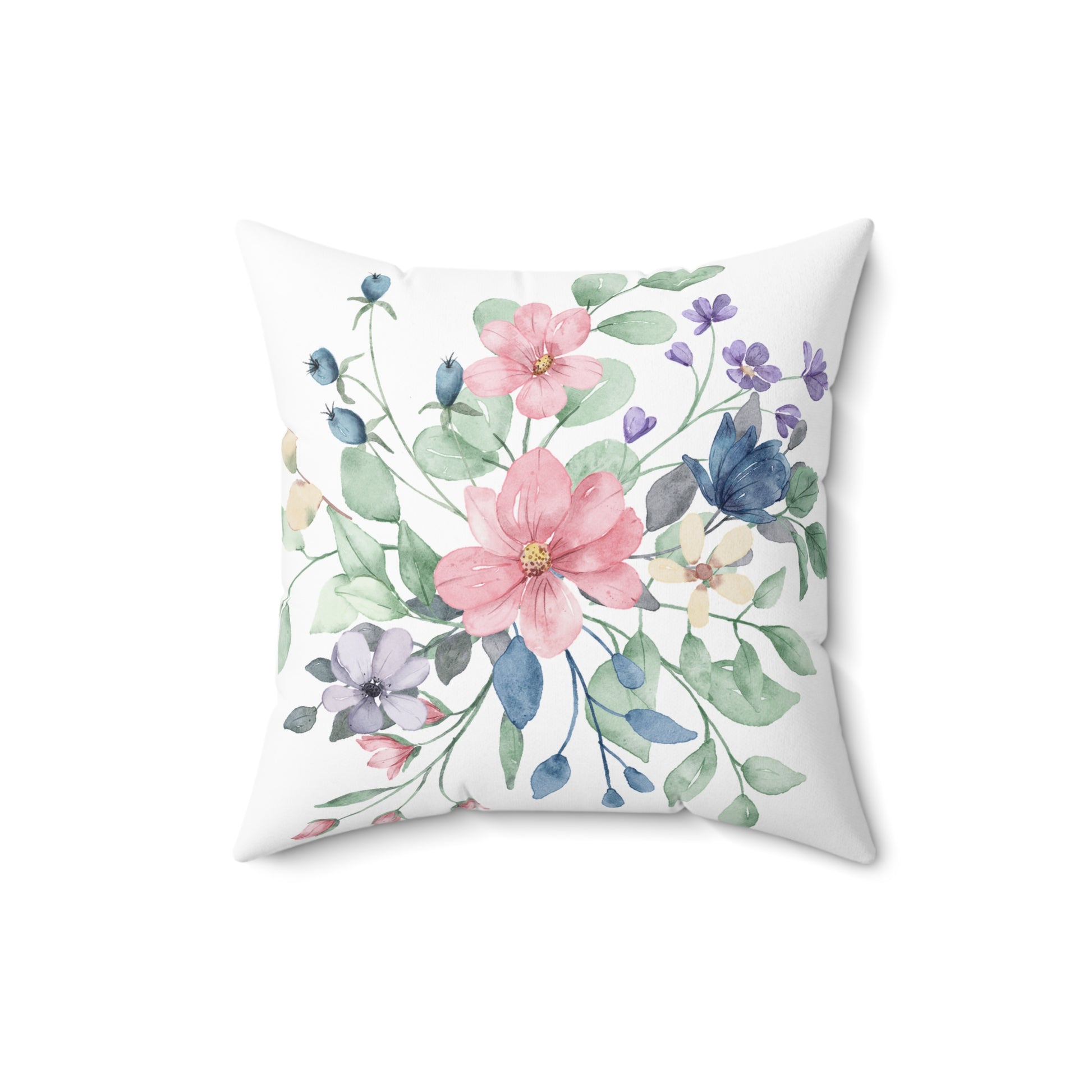 Floral pillow with pink and blue flowers on a white background