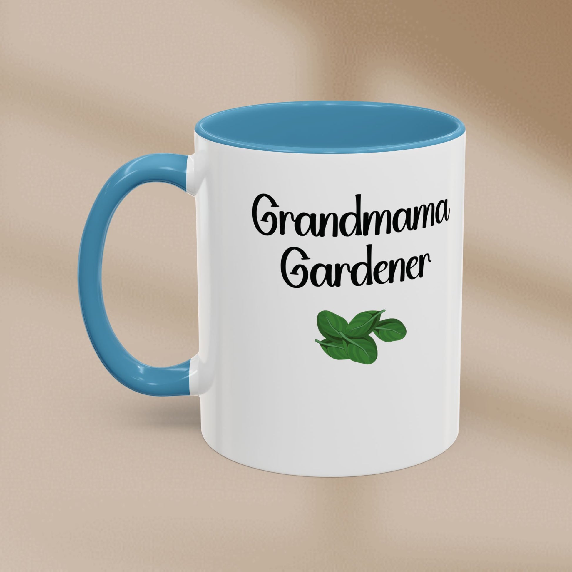 Mug with 'Grandmama Gardener' text and green leaf design on a beige background