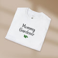 White t-shirt with 'Mommy Gardener' text on a beige background