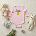 Pink baby onesie with 'Baby Gardener' text and emoji on a white background