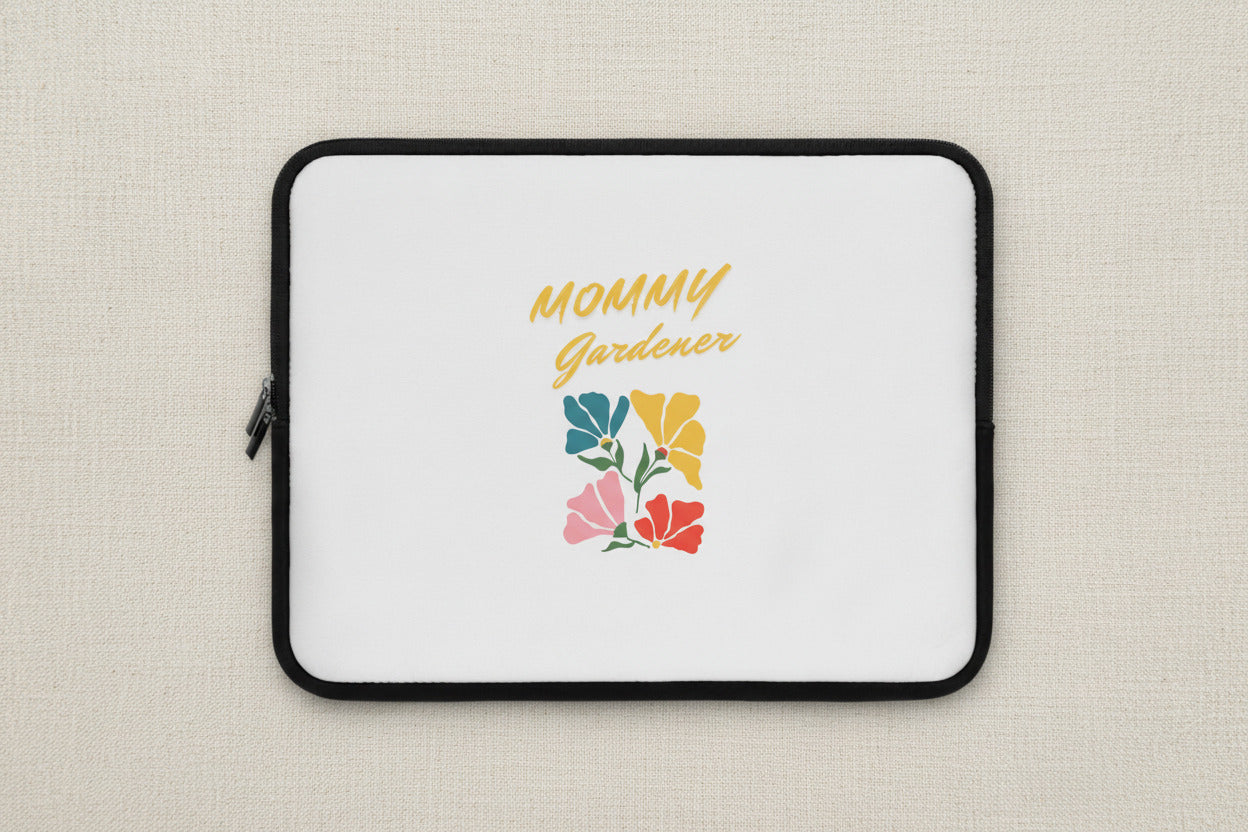 Laptop sleeve with 'Mommy Gardener' text and colorful floral design on a white background
