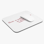 White mouse pad with red text and a white mouse on a white background