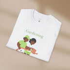White t-shirt with 'Gardening' text and graphic of two people gardening on a beige background