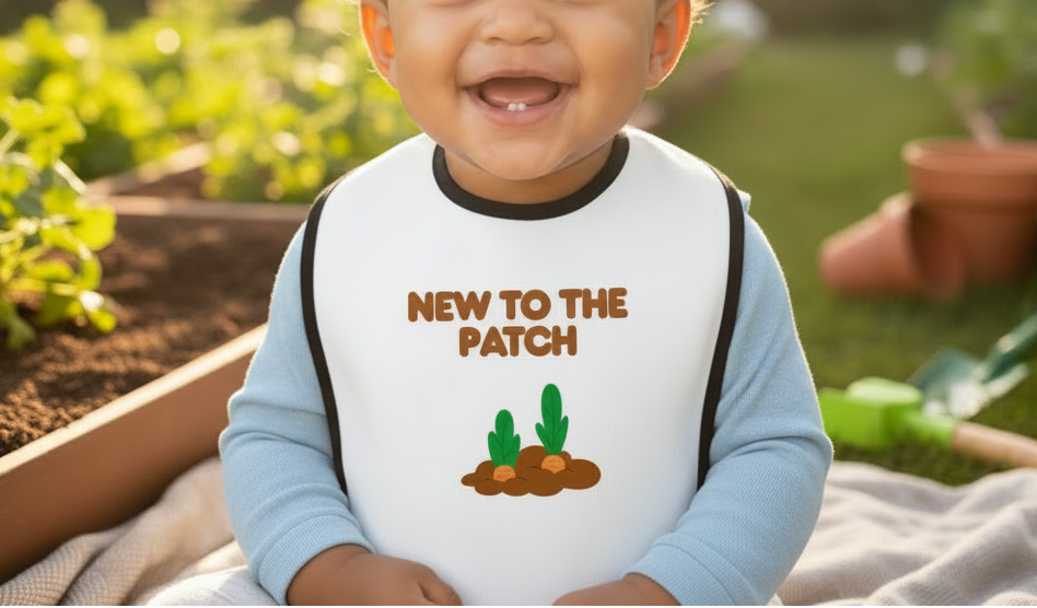 Child wearing a shirt with 'New to the Patch' text and cactus graphics in an outdoor setting.
