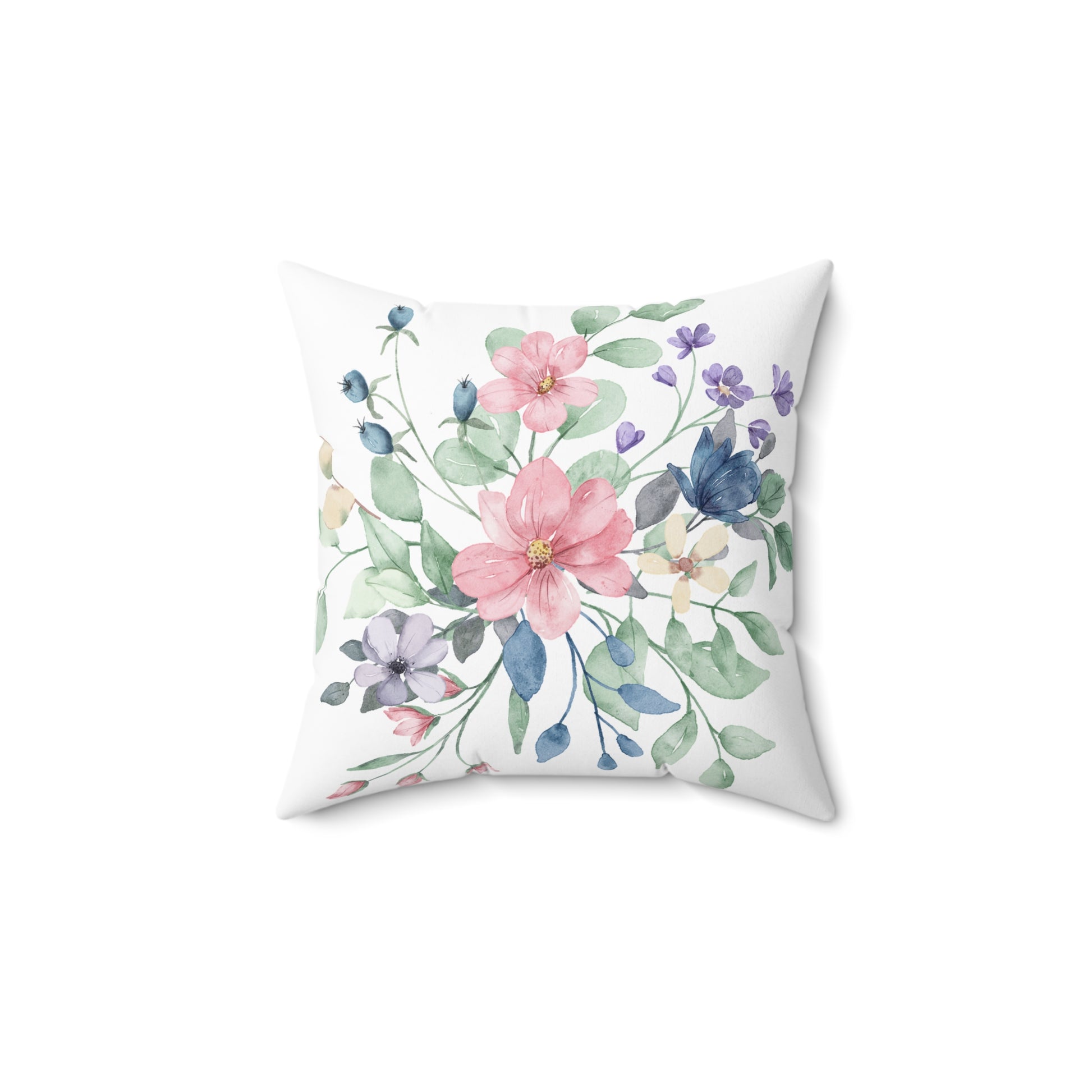 Floral pillow with pink and blue flowers on a white background