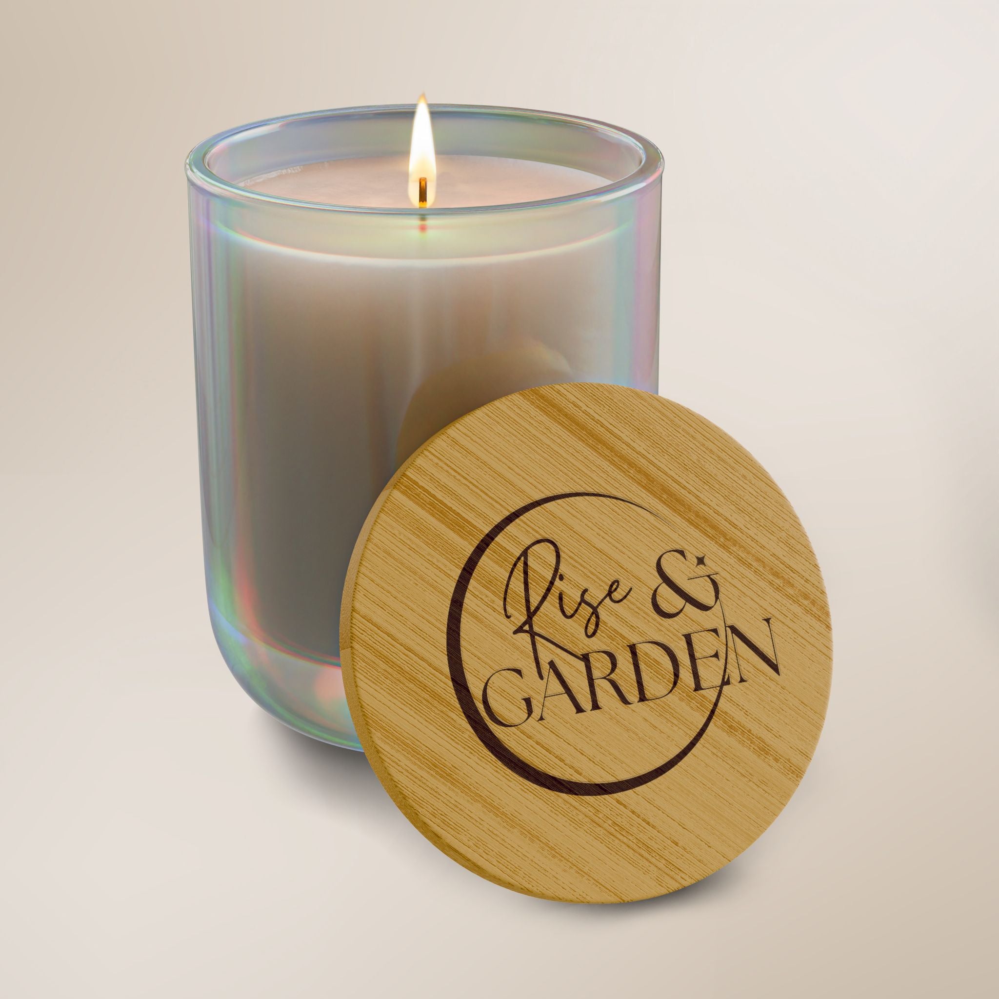 Candle in a glass jar with a wooden lid labeled 'Rise & Garden' on a beige background