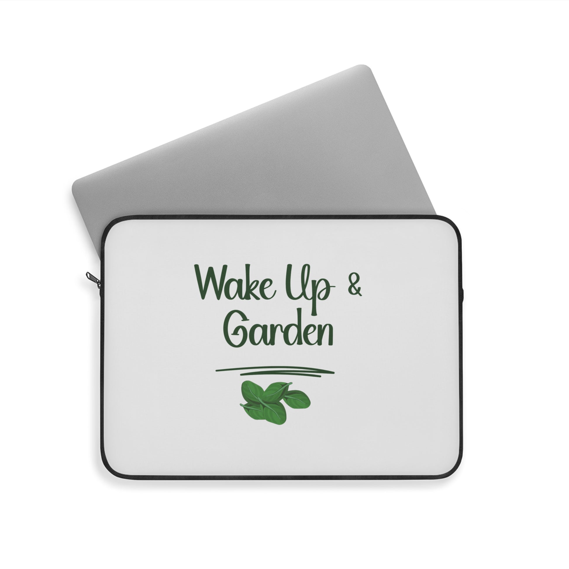 Laptop sleeve with 'Wake Up & Garden' text and leaf design on a white background