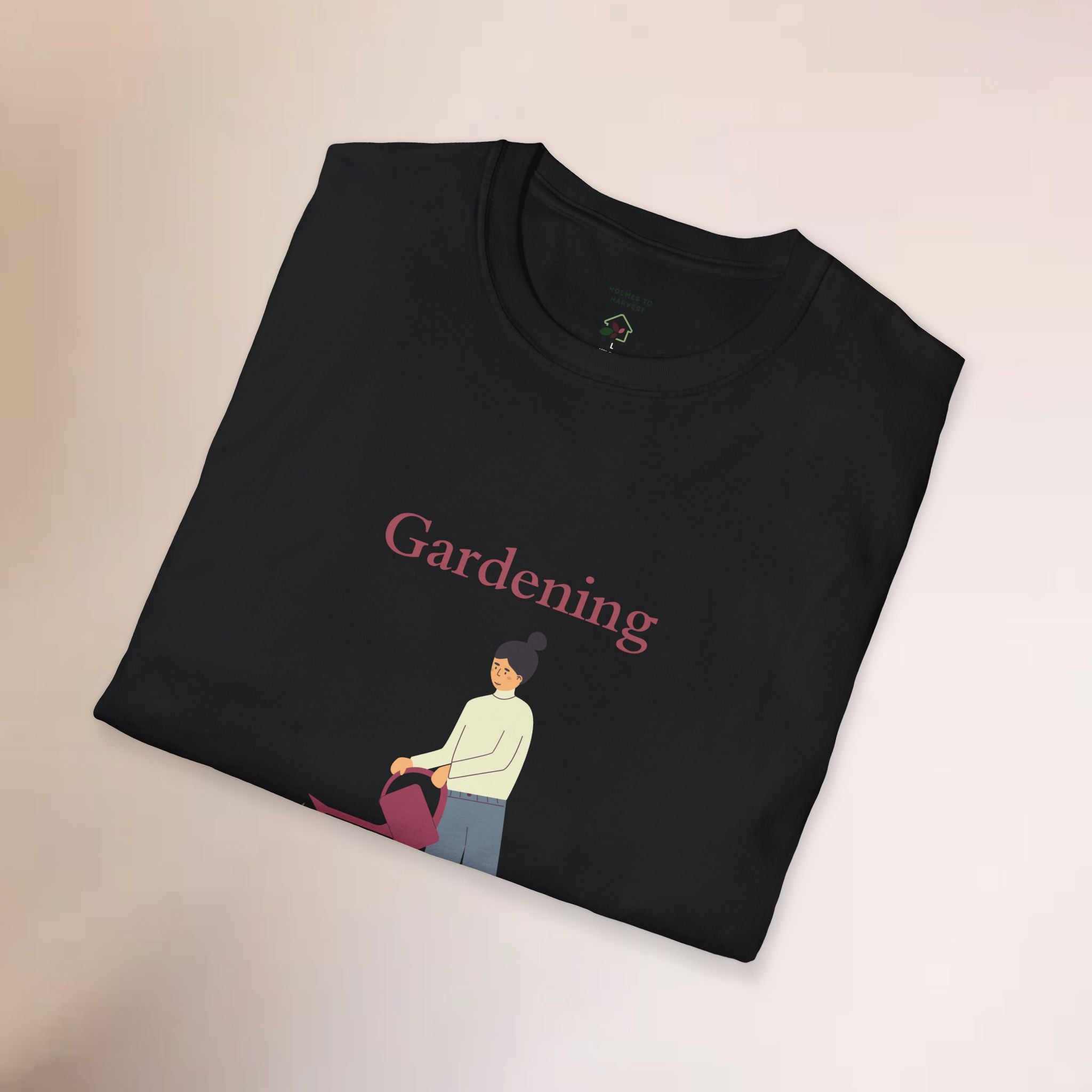 Black t-shirt with 'Gardening' text and graphic of a person gardening on a beige background