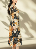 Woman wearing a floral dress with a neutral background