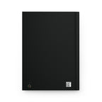 Black rectangular object with a QR code on a white background