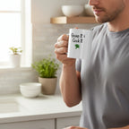 White mug with 'Grow It & Cook It' text and a broccoli illustration on a beige background