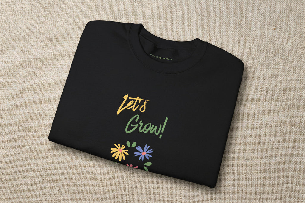 Folded dark gray t-shirt with 'I'll find you...' text on a white background