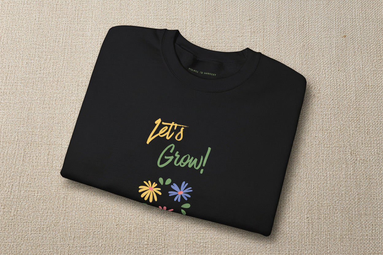 Folded dark gray t-shirt with 'I'll find you...' text on a white background