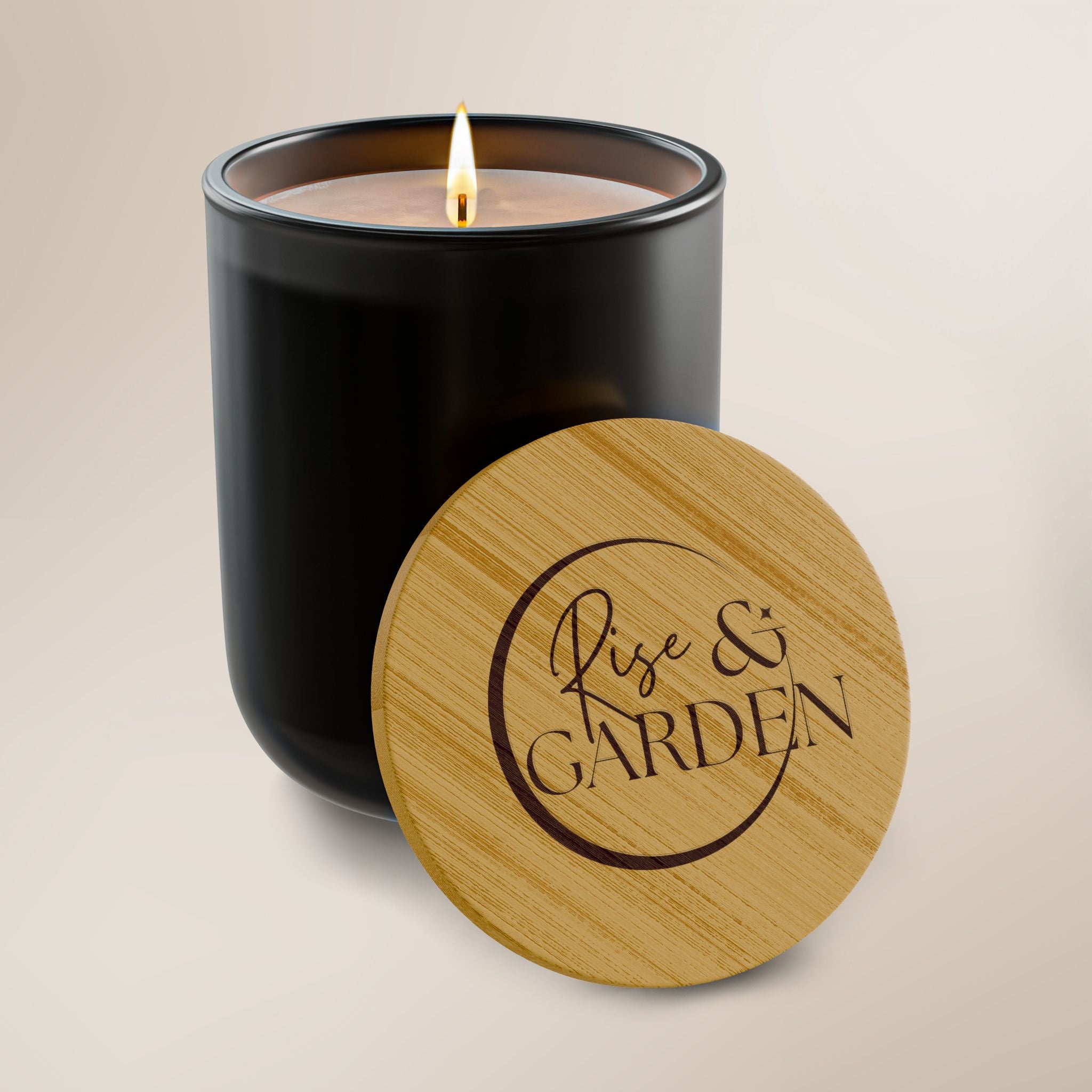 Black candle with a wooden lid featuring 'Rise & Garden' on a beige background