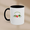White mug with black handle featuring 'Gardening Rocks' text and vegetable icons on a beige background