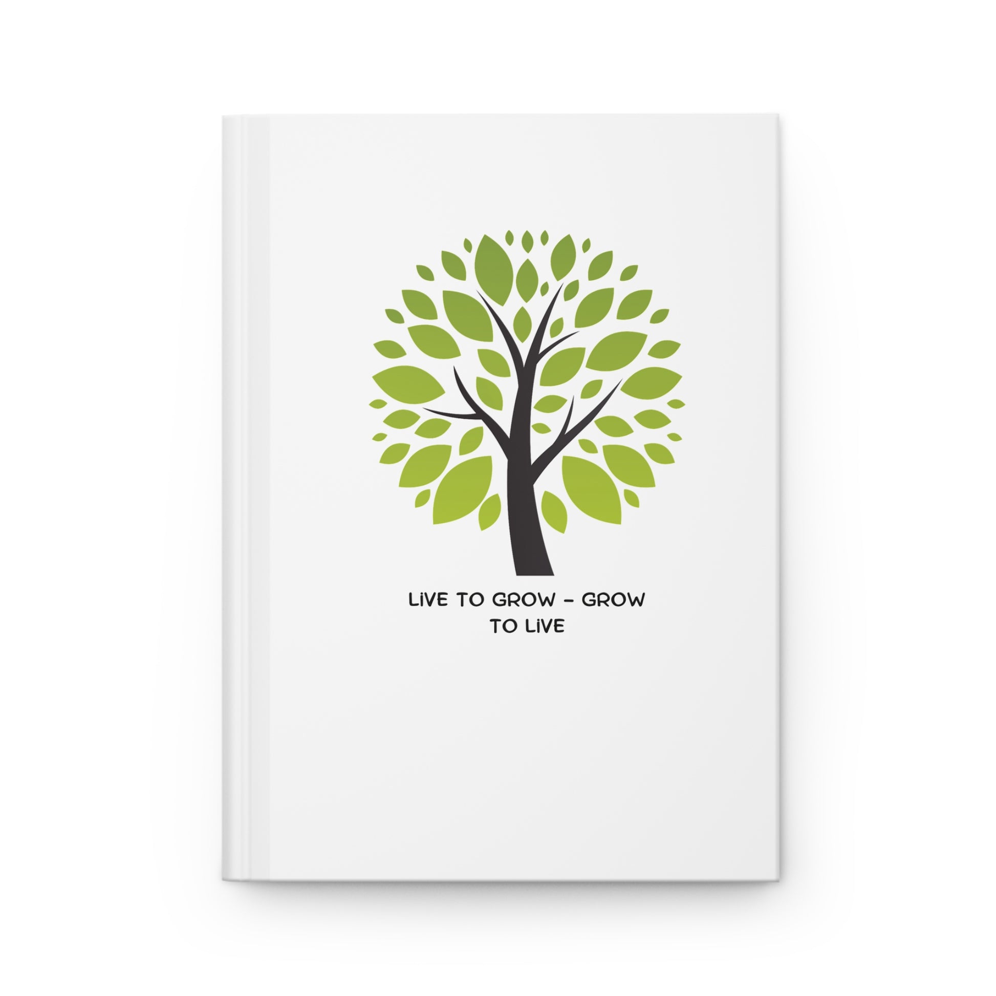 White notebook with a green tree design and text on a white background