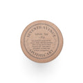 Seventh Avenue Apothecary candle lid on a white background