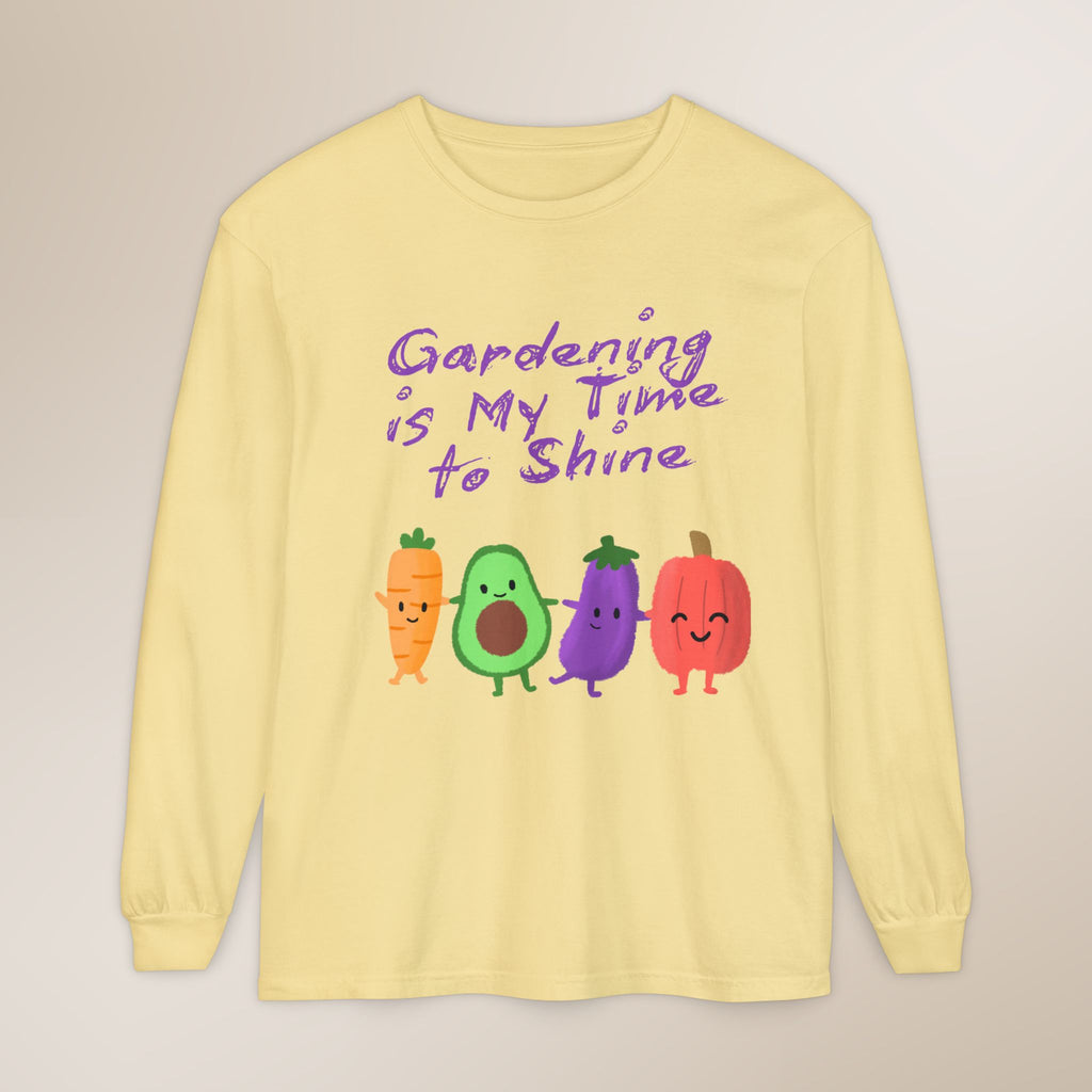 Yellow long-sleeve shirt with cartoon vegetables and text 'Gardening is My Time to Shine' on a beige background