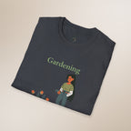 Folded t-shirt with 'Gardening' text and graphic on a beige background