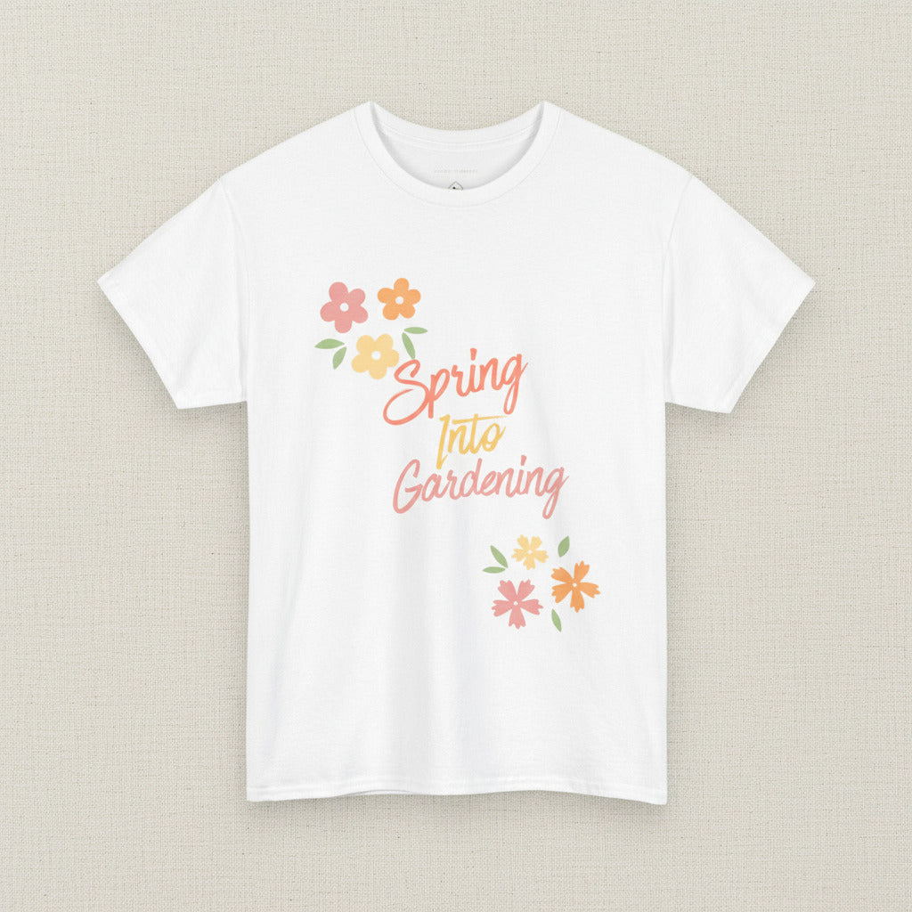 White t-shirt with 'Spring Into Gardening' text and floral designs on a white background