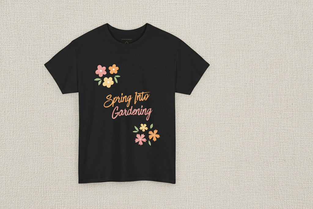 Black t-shirt with 'Spring Into Gardening' text and floral designs on a white background