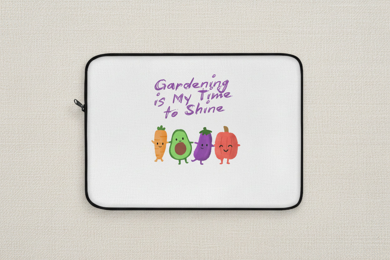 Laptop sleeve with cartoon vegetables and 'Gardening is My Time to Shine' text on a white background