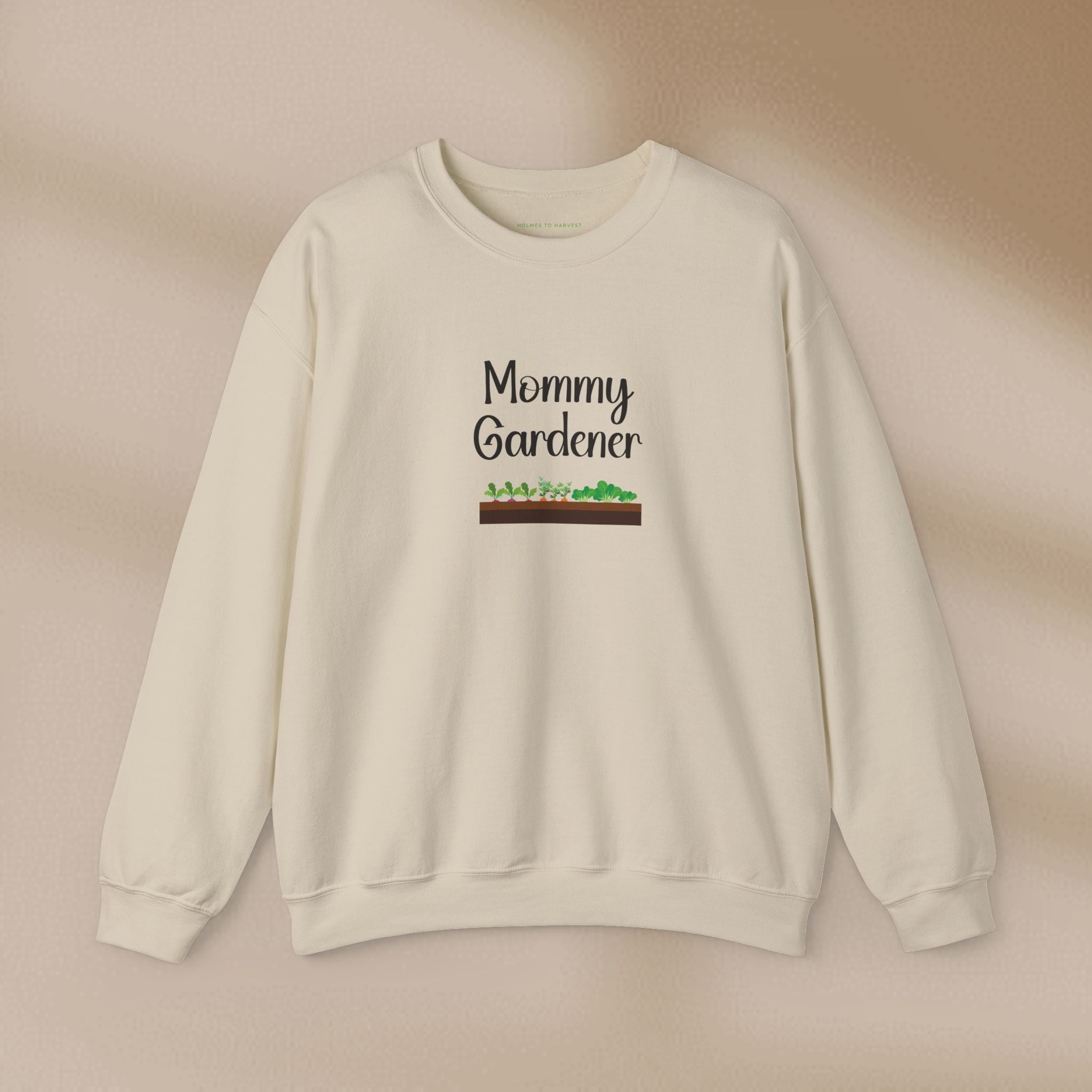 Beige sweatshirt with 'Mommy Gardener' text on a beige background