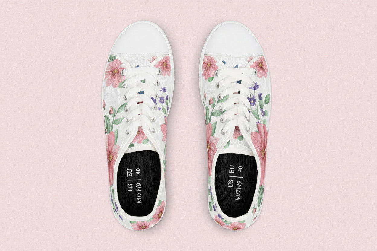 White sneakers with floral patterns on a beige background