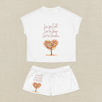 White t-shirt and shorts set with autumn-themed design and text on a white background