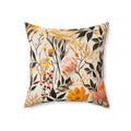 Floral patterned pillow with orange, pink, and yellow flowers on a white background