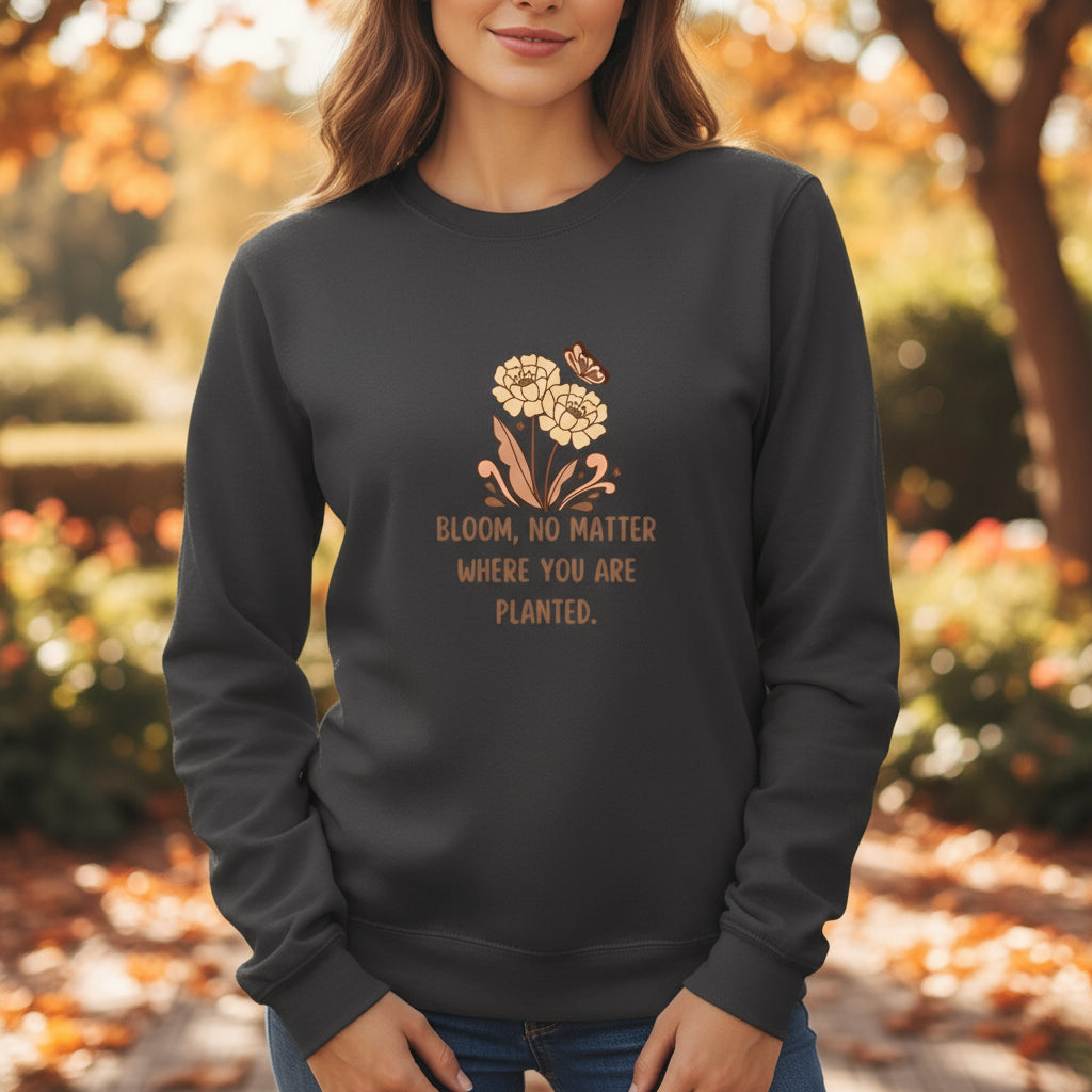 Black long-sleeve shirt with floral design and text on a beige background