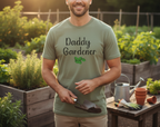 Man wearing a 'Daddy Gardener' t-shirt in a garden setting