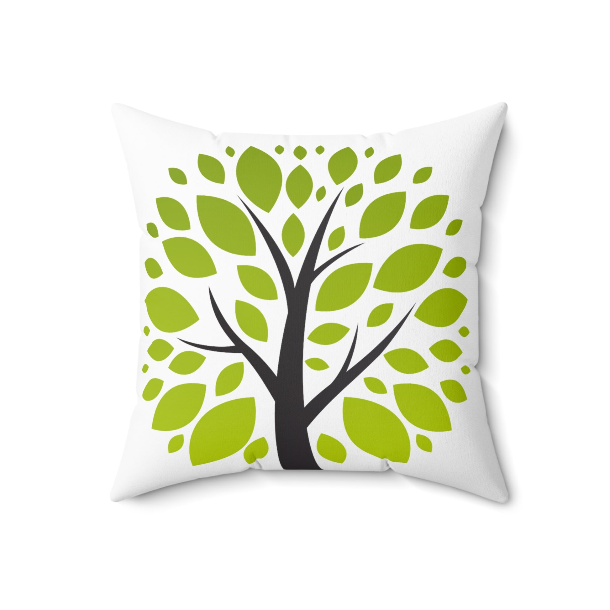 Decorative pillow with a tree design featuring green leaves on a white background