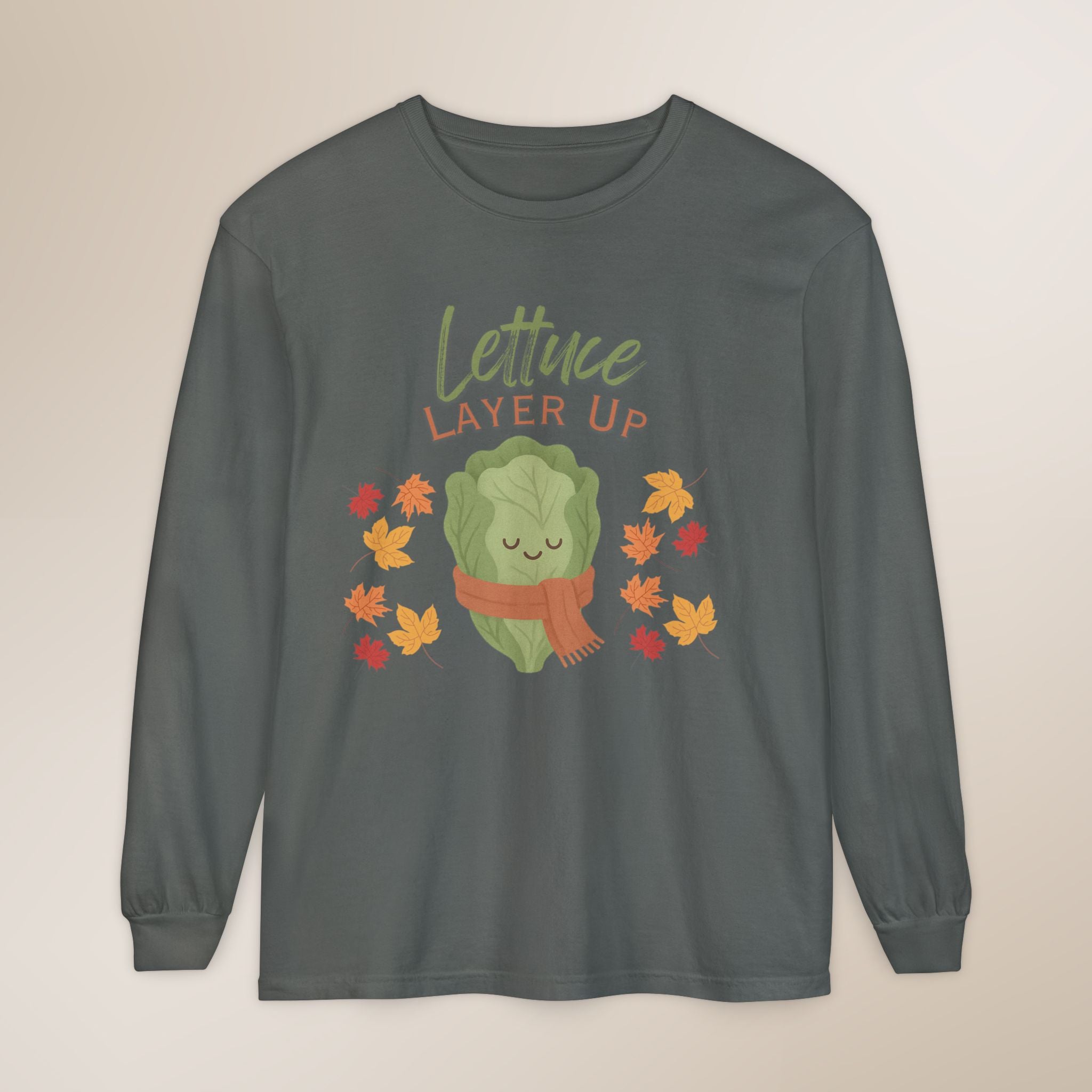 Long-sleeve shirt with a lettuce graphic and 'Lettuce Layer Up' text on a beige background