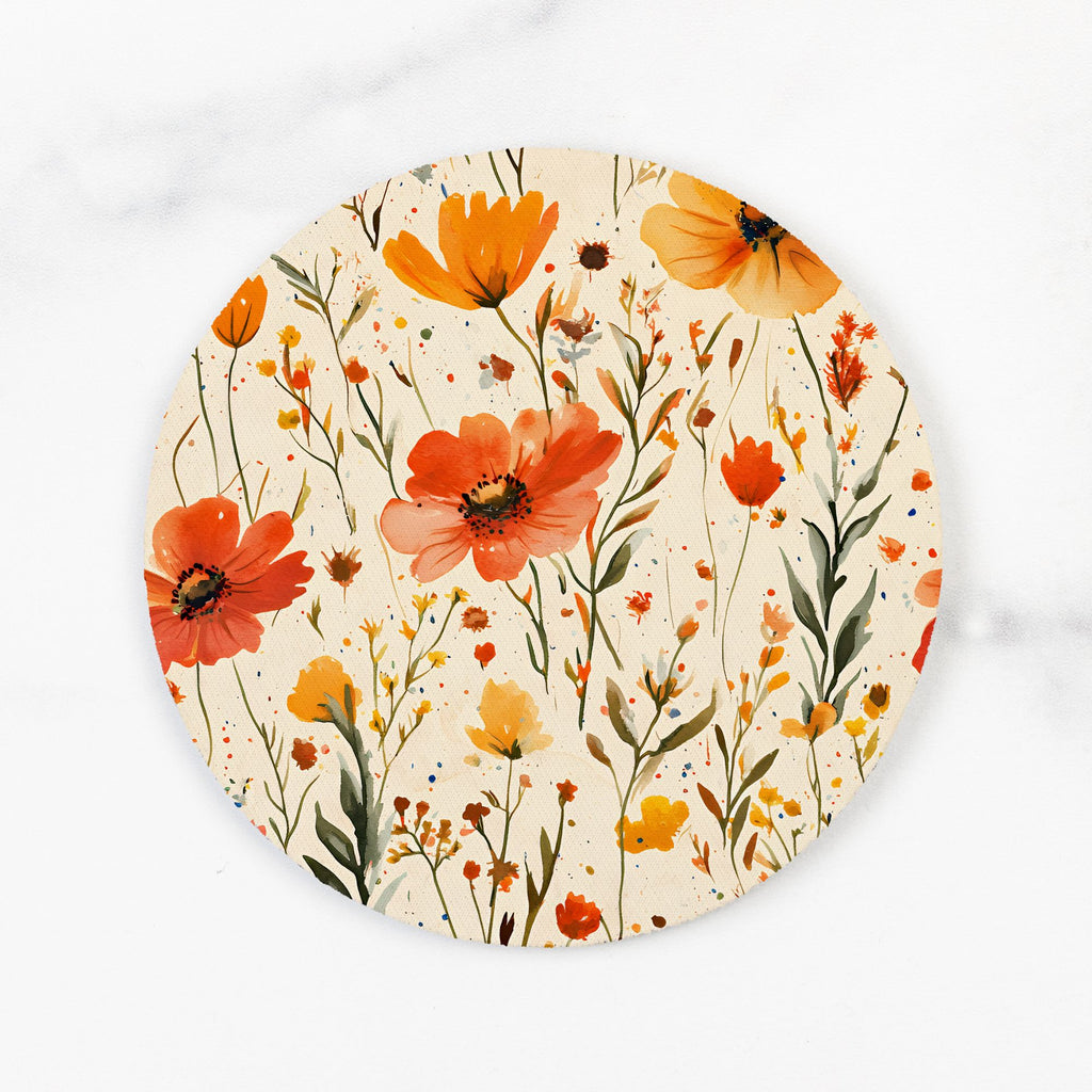 Round ceramic plate with floral design on a white background